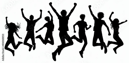 Silhouettes of a team of young people jumping together. Black and white