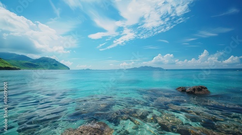 clear blue sea, surrounded by lush greenery and vibrant coral reefs