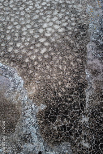 Unique desert pattern formed in rock from water photo