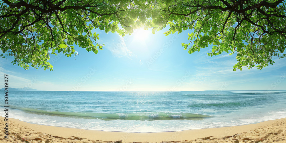 A beautiful beach scene with a clear blue sky and a calm ocean