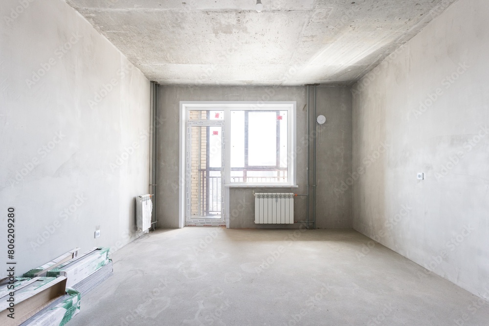 interior of the apartment without decoration in gray colors. rough finish interior of the apartment without decoration in gray colors. rough finish