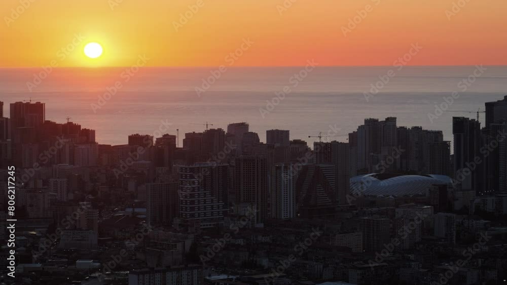 Batumi, Georgia top view at sunset. Batumi from observation deck Stunning Dramatic Architectural Landmarks of Batumi City and Sunset in Background, Tourist Destination in Georgia Batumi, Georgia top view at sunset. Batumi from observation deck Stunning Dramatic Architectural Landmarks of Batumi City and Sunset in Background, Tourist Destination in Georgia