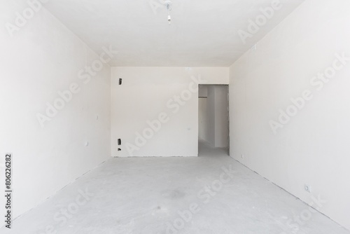 interior of the apartment without decoration in gray colors. rough finish