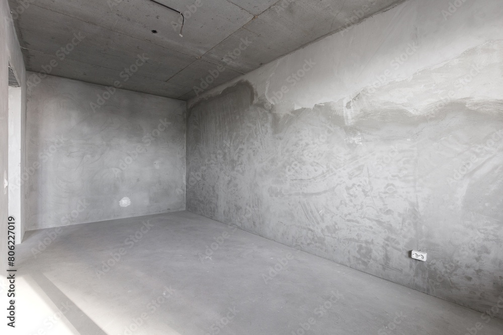 interior of the apartment without decoration in gray colors. rough finish interior of the apartment without decoration in gray colors. rough finish