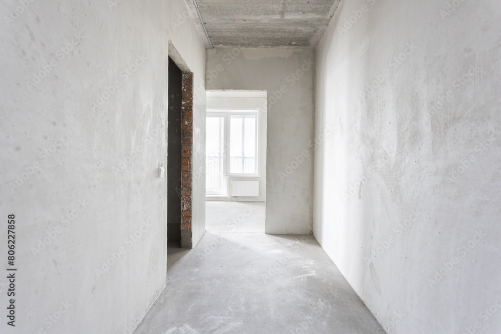 interior of the apartment without decoration in gray colors. rough finish interior of the apartment without decoration in gray colors. rough finish