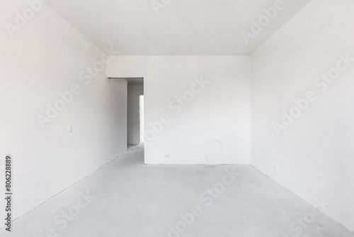 interior of the apartment without decoration in gray colors. rough finish