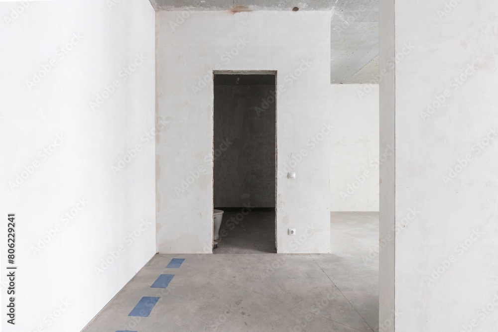 interior of the apartment without decoration in gray colors. rough finish interior of the apartment without decoration in gray colors. rough finish