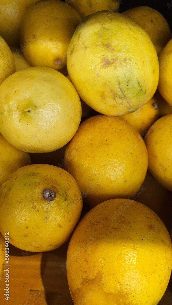 Close up pile of tasty fresh limes sold at the market as a background. Close up pile of tasty fresh limes sold at the market as a background.
