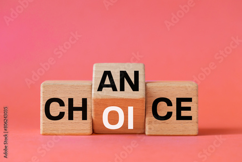 Obraz na płótnie Symbol chance and choice and Flipped a wooden cube with words