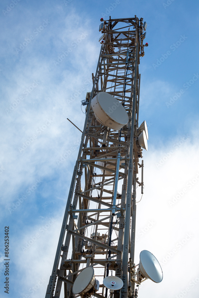 Telecoms masts on top of the mountain Puig de la Llorenca on a clear sunny day overlooking Cumbre Del Sol, Spain Telecoms masts on top of the mountain Puig de la Llorenca on a clear sunny day overlooking Cumbre Del Sol, Spain