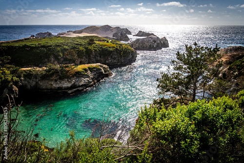 Turquoise ocean leads out to the Pacific in Point Lobos National Reserve in Carmel, California.