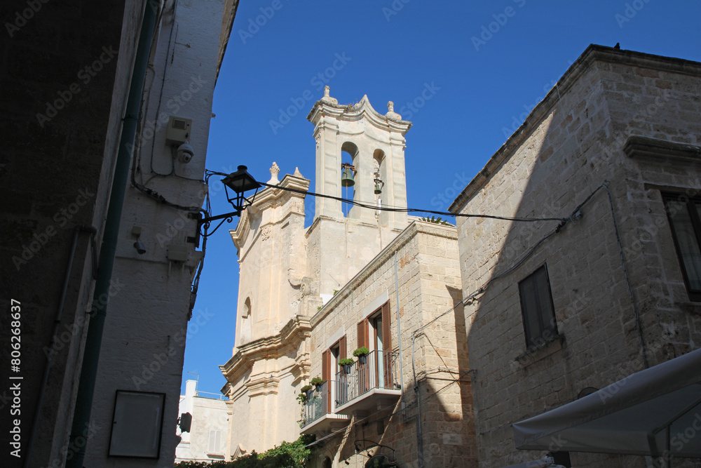 Tower of The Church of Saint Mary of the Assumption in Piazza Vittorio Emanuele II, Polignano a Mare, Puglia, Italy.