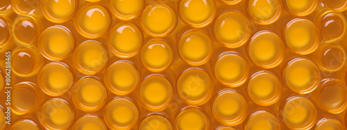 Macro shot of honeycomb cells, highlighting the natural geometric pattern.