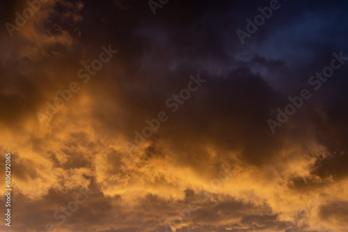 Dramatic clouds glowing at sunset, on a spring evening