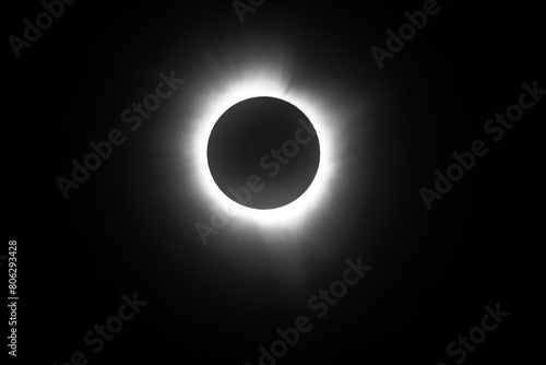 Photo during eclipse totality with visible corona of the sun.