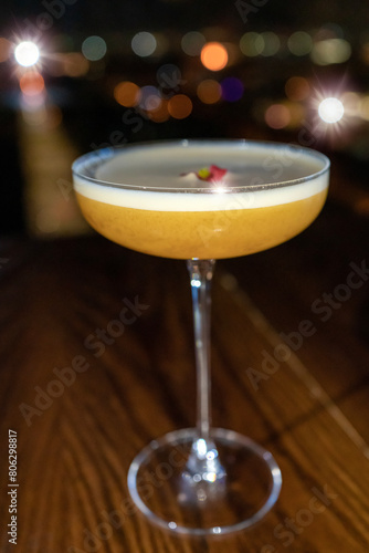 A glass of delicious cocktail at the bar. Concept of cocktails, alcoholic drinks, taste, party, mix.