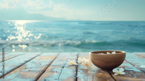 Harmony concept, tranquil scene with bowl and flowers on dock overlooking ocean, delicate quiet still untroubled unruffled photo
