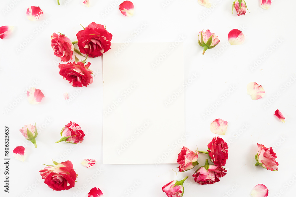 Framework from roses on white background. Blank Card with Red Roses Flat Lay Framework from roses on white background. Blank Card with Red Roses Flat Lay