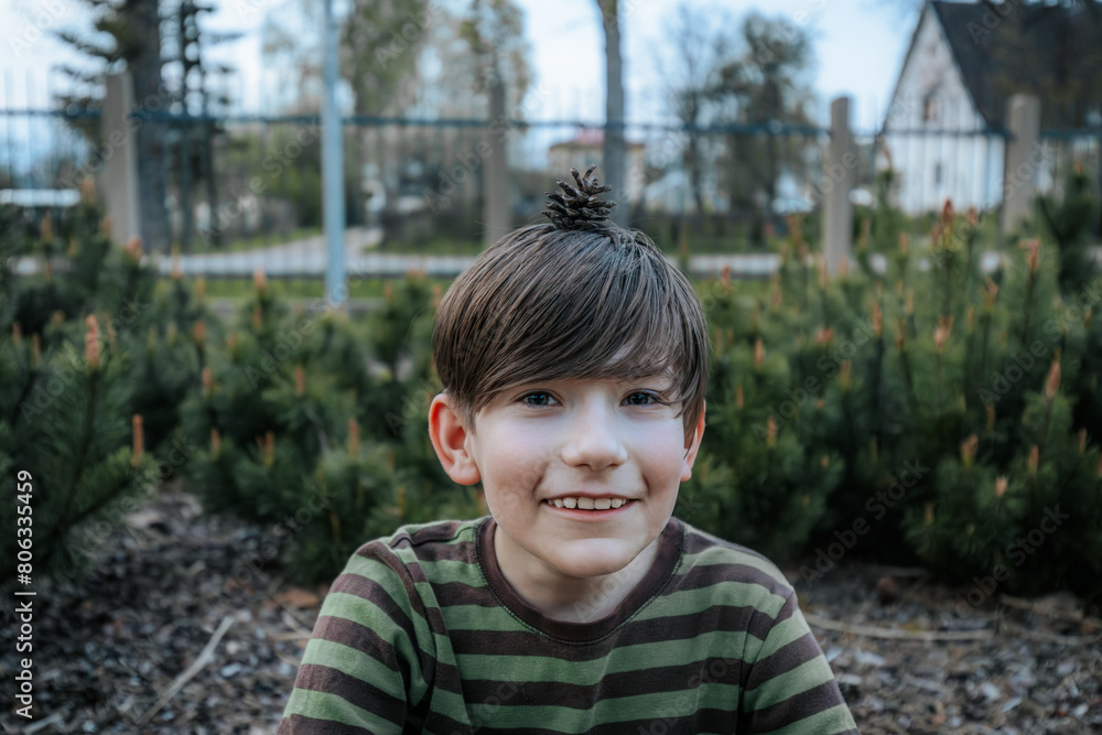 boy sits and meditates. The child rests and meditates. Smiling happy child boy sits and meditates. The child rests and meditates. Smiling happy child