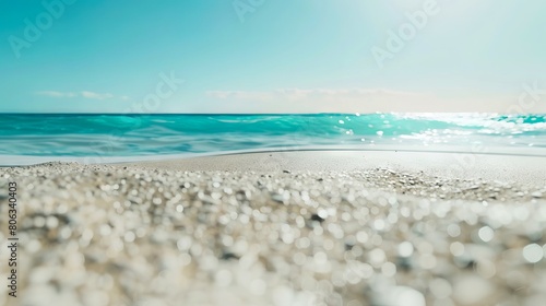 A beach with clear water and white sand.