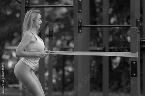 athletic woman exercising in the park