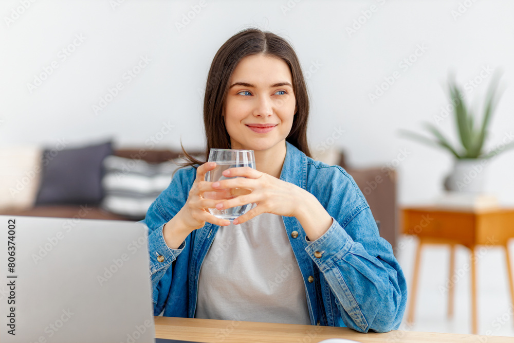 Remote work Female freelancer working sitting at the table at home