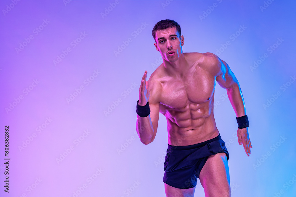 Runner concept. Athlete sprinter running on blue background. Fitness and sport motivation. Trail run.