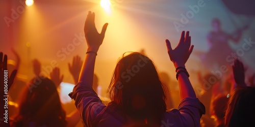 a woman with her hands up in the air photo