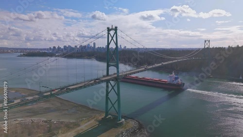 aerial view of Lions Gate bridge in Vancouver during sunrise with clouds
