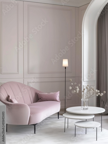 Living room interior - pink sofa  three coffee tables with a vase with gypsophila. Pink walls  arch with gray curtain