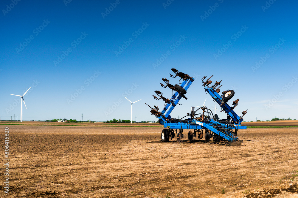 Fototapeta premium combine harvester working in a field