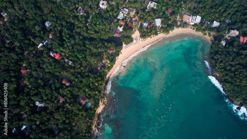 Aerial view of Hiriketiya Beach in Dikwella. Blue beach in Sri Lanka. Indian Ocean. High quality 4k footage
