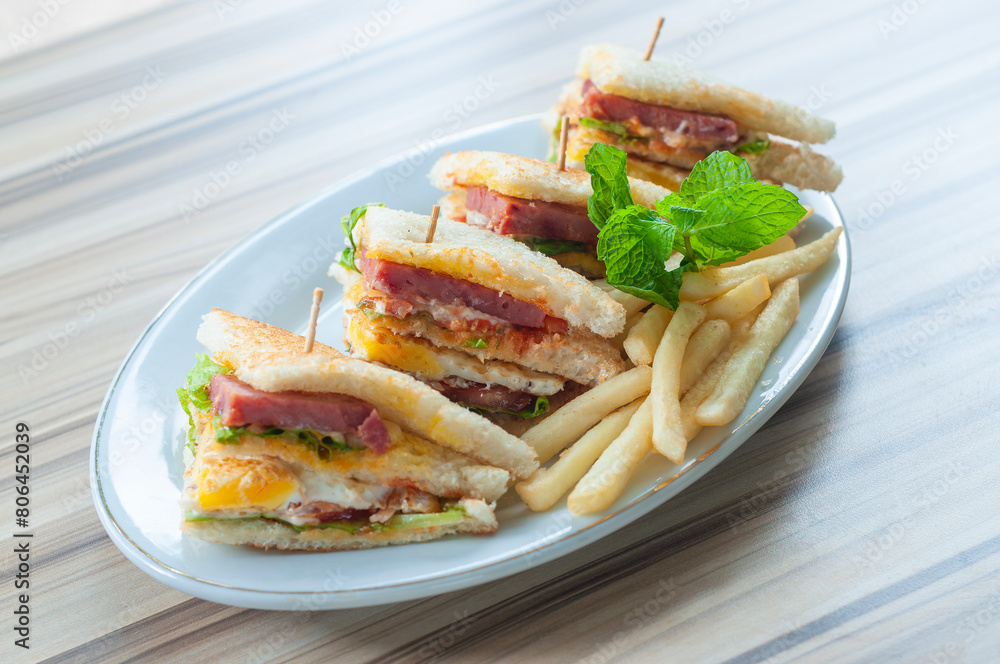 Sandwich Omelet served with fried potato Sandwich Omelet served with fried potato