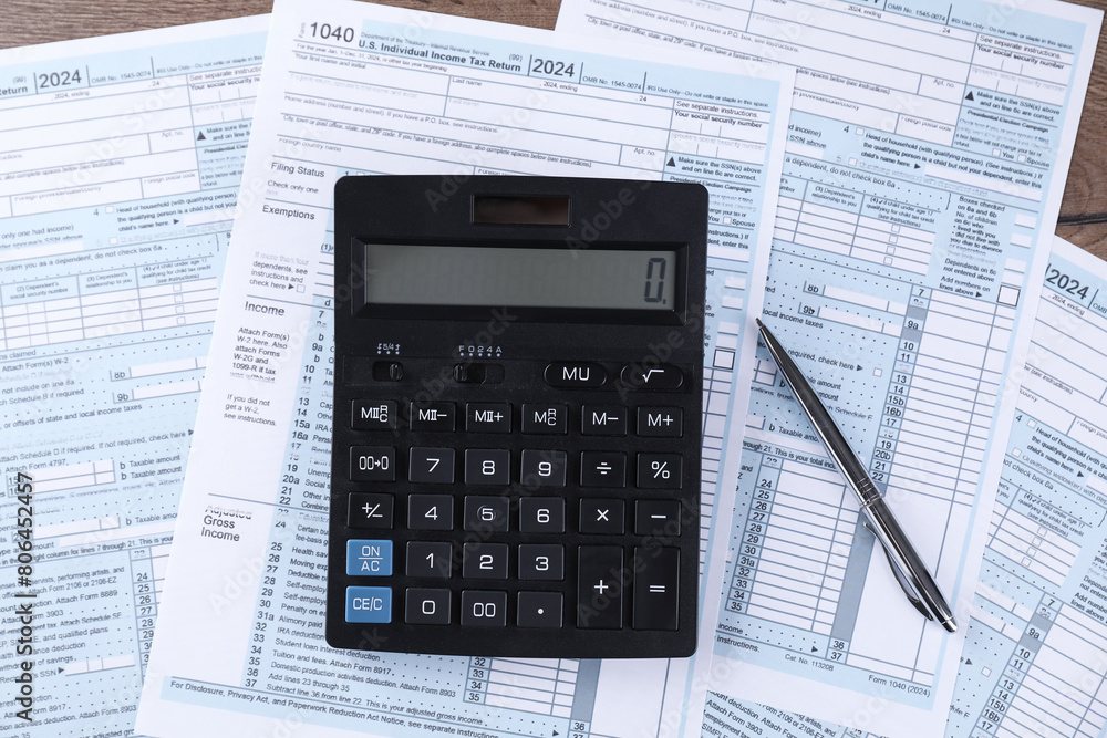 Tax accounting. Calculator, documents and pen on table, flat lay Tax accounting. Calculator, documents and pen on table, flat lay