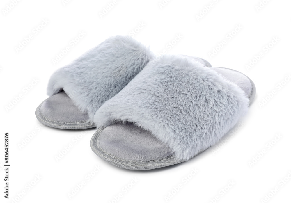 Pair of soft slippers with fur isolated on white Pair of soft slippers with fur isolated on white
