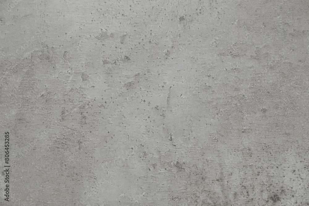 Fototapeta premium Grey concrete textured surface as background, closeup