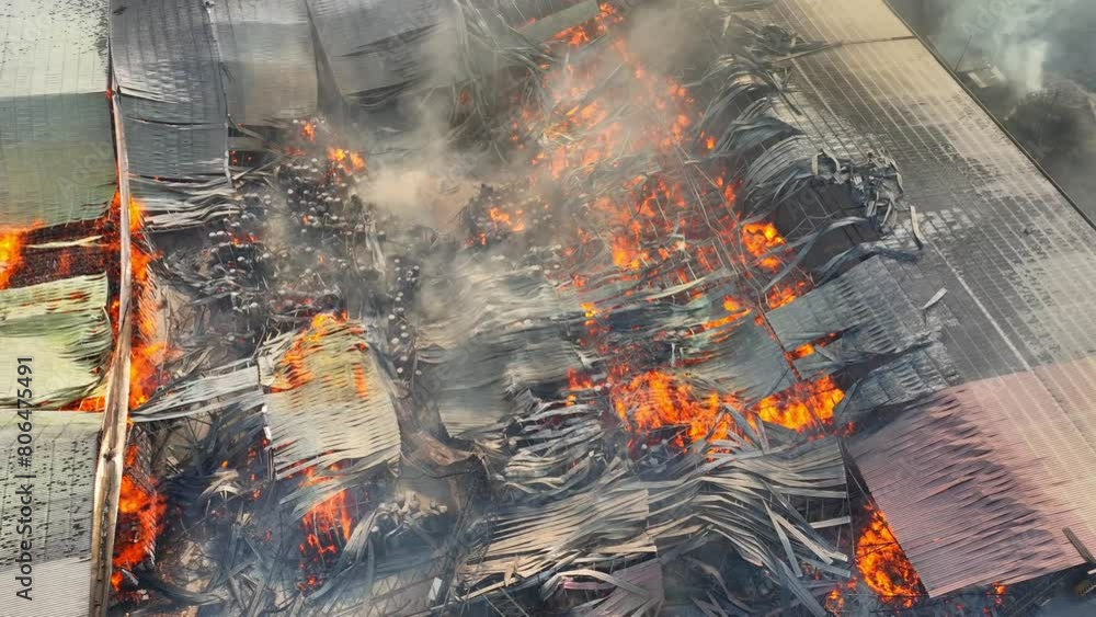Amidst the wreckage of the industrial complex, fire reigns supreme ...