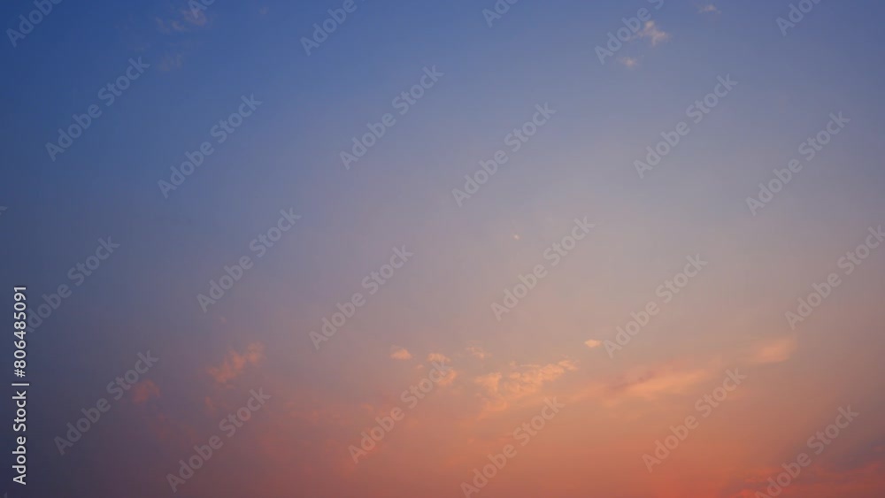 A sunset sky, where the clouds dance in a timelapse, reflecting the shifting hues from vibrant golds to peaceful blues. Cloud formations concept. High-quality video. Time-lapse. Sky background.
A sunset sky, where the clouds dance in a timelapse, reflecting the shifting hues from vibrant golds to peaceful blues. Cloud formations concept. High-quality video. Time-lapse. Sky background.