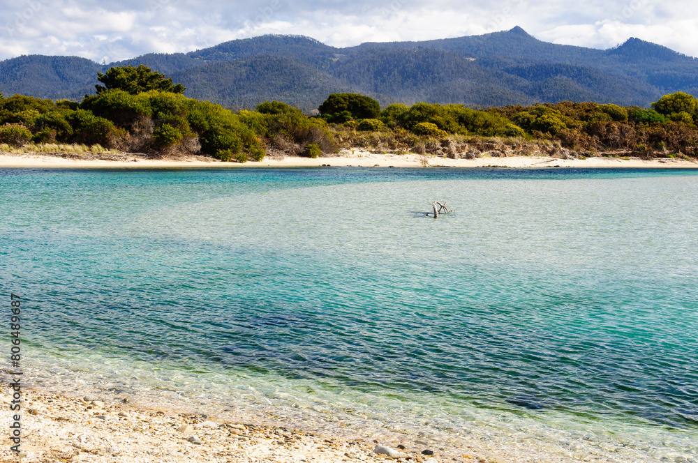 Henderson Lagoon with its almost transparent waters is a major bird sanctuary - Falmouth, Tasmania, Australia Henderson Lagoon with its almost transparent waters is a major bird sanctuary - Falmouth, Tasmania, Australia