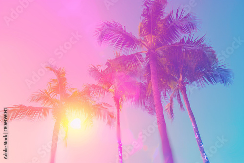 This retro-inspired photograph captures the essence of the '80s with its vibrant palm trees set against a dreamy sky backdrop. The pastel colors and soft focus add to the nostalgic charm © Aleksandra