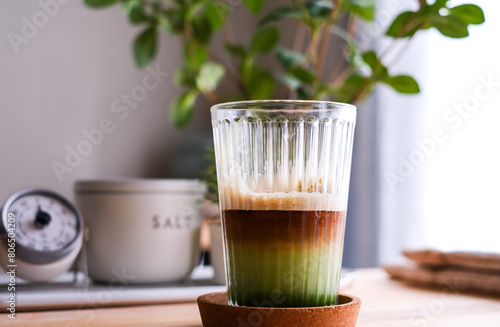 Ice matcha tea with coffee and milk. drink and refreshment concept.