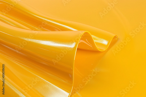 Golden ribbon wave design on black background with orange and yellow accents, perfect for business card or wallpaper photo