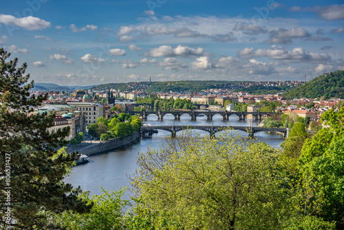 Old town of Prague. Czech Republic over river Vltava with Charles Bridge on skyline. Prague panorama landscape view with red roofs. Prague view from Letna Park, Prague, Czechia.