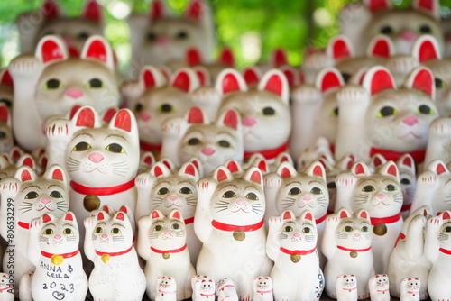 Manekineko or Waving Cat at Daikeizan Gotokuji temple in Tokyo, Japan - 日本 東京 大谿山 豪徳寺 招き猫 photo