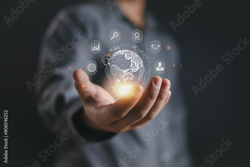 Businessman uses their hands to communicate Global connectivity, development, successful business concept Computer strategy, research, vision, network economy market technology background. 