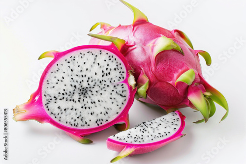 An exotic dragon fruit with a vibrant pink exterior and white flesh