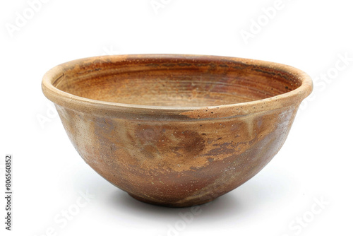 A handcrafted pottery bowl with a natural clay texture and a rustic finish © Venka