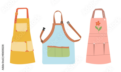 Set of garden aprons of different shapes and stylish pink, blue , yellow colors. Vector illustration on white background ,flat cartoon style for your design.