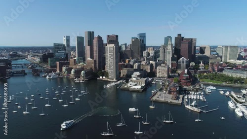 Aerial View of Boston harbor city skyscrapers with beautiful modern city with sea from Drone in 4K photo