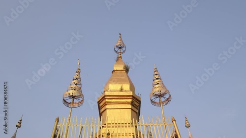 golden pagodas on phousi hill in Luang Prabang, Laos traveling Southeast Asia photo